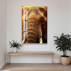a large elephant with its trunk raised, creating a striking visual focal point. The elephant is the central element in the room, with a bench and potted plants placed nearby.