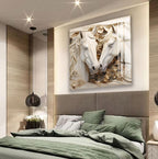 a bedroom with a large bed, a wooden headboard, and a framed artwork of two white horses on the wall above the bed.