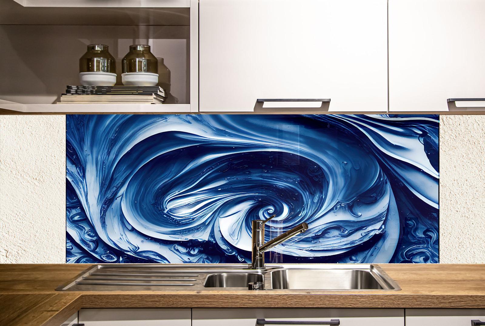 a kitchen with a large, abstract blue and white swirl design on the backsplash behind the sink. The sink is positioned under the backsplash, and there are white cabinets above it.