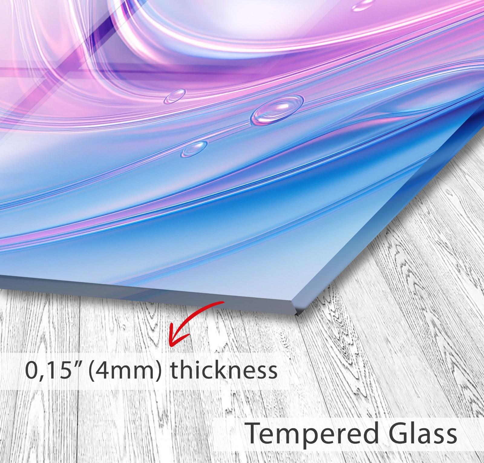 a close up of a piece of glass on a wooden floor