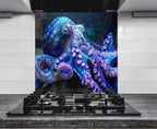 a large blue and purple octopus sitting on top of a stove