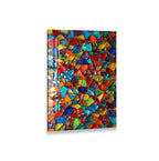 The image is a vibrant mosaic of colorful glass pieces, creating a visually striking and intricate pattern.